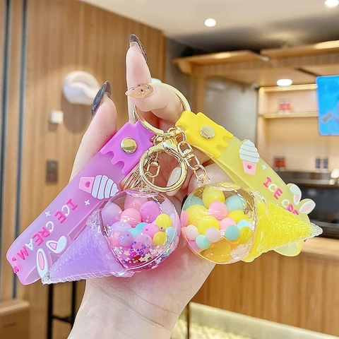 Portachiavi Creativo a Forma di Bottiglia Galleggiante con Sabbie Mobili a Gelato Cinturino in Silicone con Chicchi di Latte Colorati Ciondolo per Borsa Regalo Donna Bambini