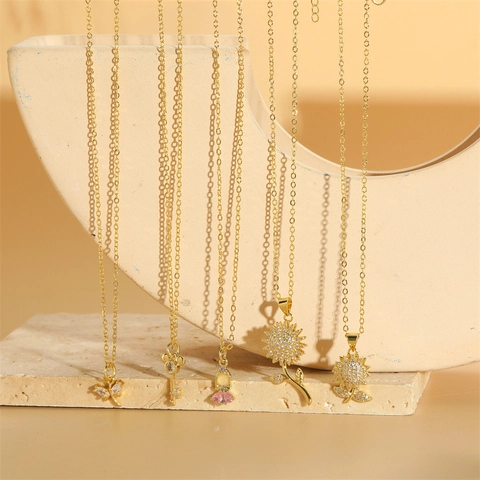 Collana di Rame Zirconia Girasole Ruotabile per Donna Farfalla Chiave Ragazza Ciondolo Catena Placcata Oro Gioielli Regalo