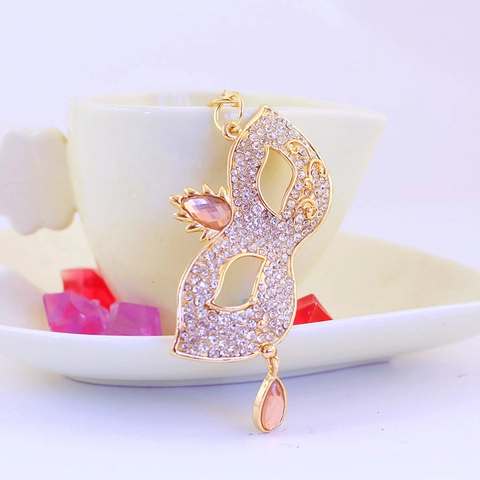 Portachiavi Donna a Maschera Mascherata Con Strass Intarsiati In Lega Dorata Ciondolo Borsa Gioielli di Moda Regalo Creativo