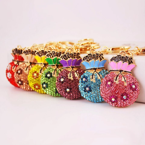 Squisito Portachiavi a Forma di Borsa della Fortuna in Lega di Zinco con Strass e Smalto a Motivo Floreale per Decorazione Borsa Donna