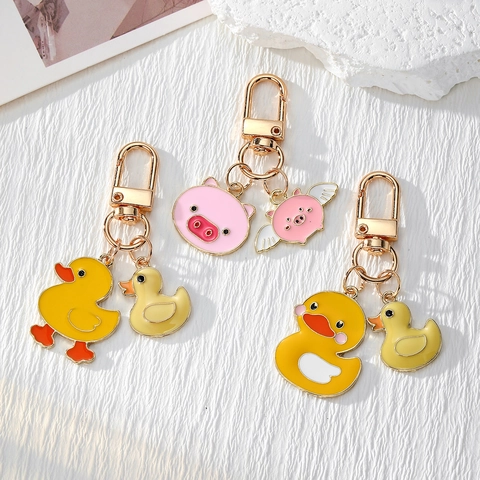 Cartoon Süßes Tier Legierung Emaille Schlüsselanhänger Gelbe Ente Rosa Fliegendes Schwein Tasche Anhänger Geschenk Für Damen Kinder