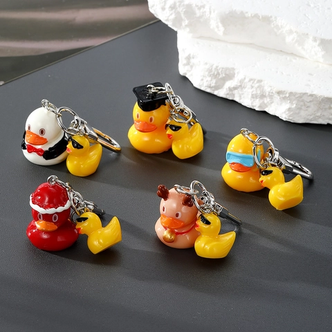 Süßes Cartoon Gelbe Ente Schlüsselanhänger Set Harz Tier Tasche Anhänger Kreatives Abschluss Weihnachten Geschenk Schlüsselring