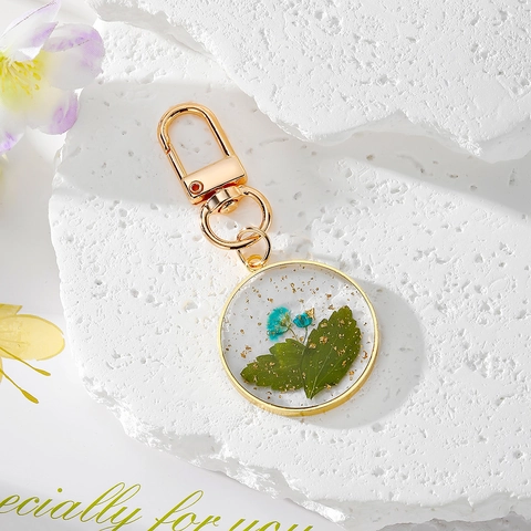 Portachiavi Fatto a Mano in Resina Trasparente con Fiori Secchi e Foglia d'Oro Ciondolo Botanico Floreale per Borsa Donna