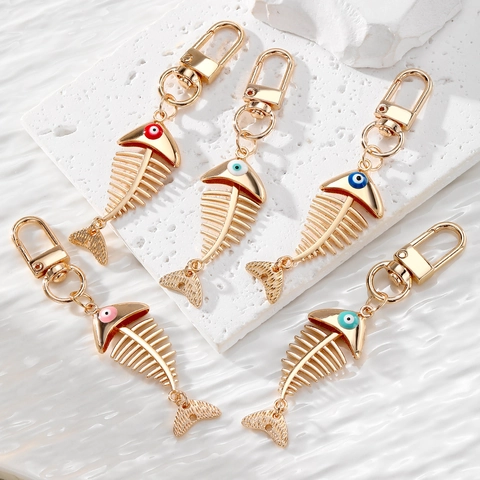 Porte-clés Arête de Poisson Mauvais Œil à la Mode en Alliage Plqué Or Émaillé Charme de Sac Squelette Accessoire Bijoux Créatif Unisexe Cadeau