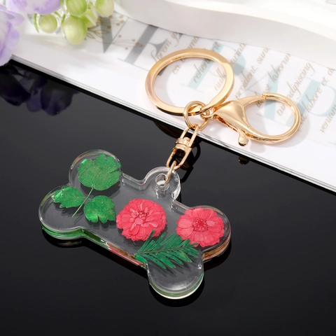 Porte-clés Créatif en Résine Transparente en Forme d'Os de Chien Avec de Vraies Fleurs Séchées Naturelles Pendentif Floral Fait à la Main