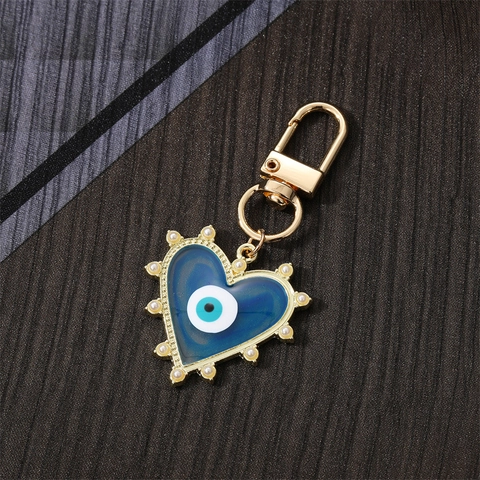 Llavero de Ojo Turco en Corazón de Aleación Acrílica para Mujer Color Caramelo Patrón de Mármol Colante de Perla Artificial