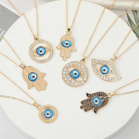 Vintage Gold Alloy Evil Eye Hamsa Hand Pendant Necklace Ethnic Blue Rhinestone Hollow Out Chain Jewelry For Women