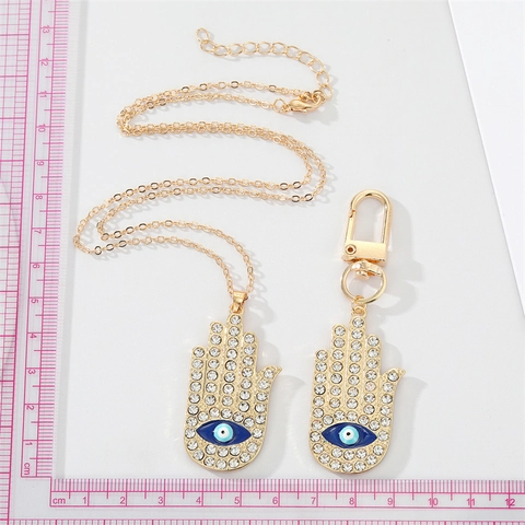 Collier Pendentif Main de Fatma avec Mauvais Oeil en Strass Plqué Or Bijoux de Style Ethnique pour Femmes Cadeau