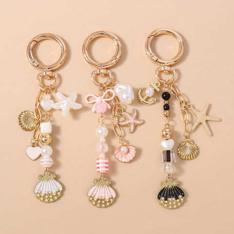 Portachiavi a Tema Oceanico Conchiglia Stella Marina Lega di Zinco Perle Artificiali Charm per Borsa Donna Gioielli Estate Regalo