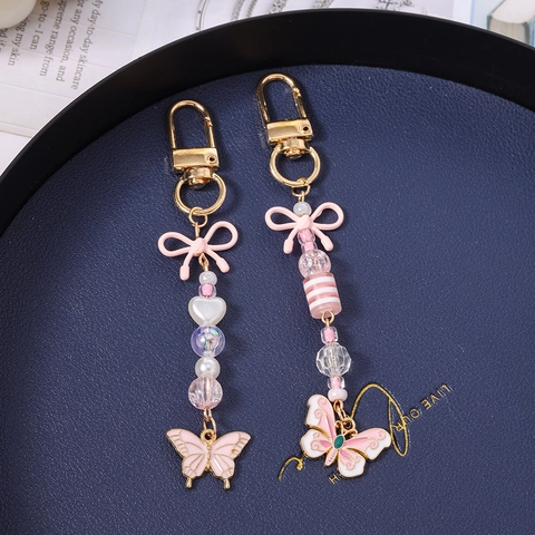 Portachiavi con Ciondolo a Forma di Farfalla e Fiocco in Perline di Acrilico alla Moda Dolce Rosa Oro Lega Ciondolo per Borsa Regalo Donna Ragazza
