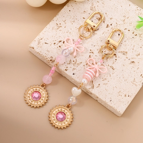 Llavero de Mujer Rosa con Abalorios Lazo y Sol Aleación de Zinc Diamante de Imitación Perla Artificial Colgante para Bolso Estilo Dulce