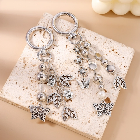 Portachiavi Vintage in Lega di Zinco Argento con Farfalla Foglia e Fiore Ciondolo a Goccia Multistrato Boémien Decorazione per Borsa Gioiello Donna