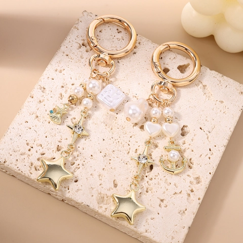 Portachiavi in Lega Trendy Con Pendenti a Stella Ancore e Conchiglie in Perla Artificiale Strass per Donna Gioielli per Borse