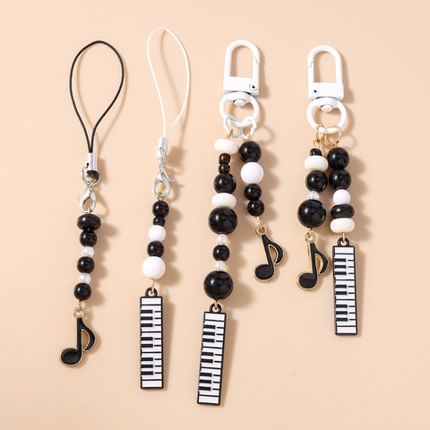 Portachiavi con Perline a Tema Musicale Nota Musicale Tasti Pianoforte per Donna Ciondolo per Telefono con Perline in Resina Nera Bianca