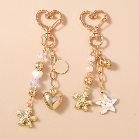 Portachiavi con Perline a Forma di Cuore e Stella Marina in Lega Dorata per Donna Ciondolo per Borsa con Perla Artificiale e Fiore