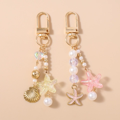 Llavero de Tema Océano con Perla Artificial Estrella de Mar y Concha de Aleación de Zinc Adorno de Bolso para Mujer