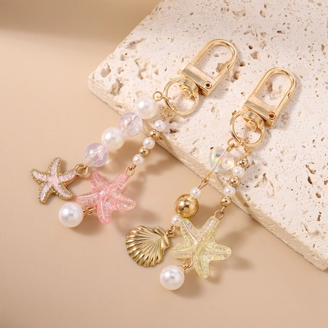 Llavero de Tema Océano con Perla Artificial Estrella de Mar y Concha de Aleación de Zinc Adorno de Bolso para Mujer