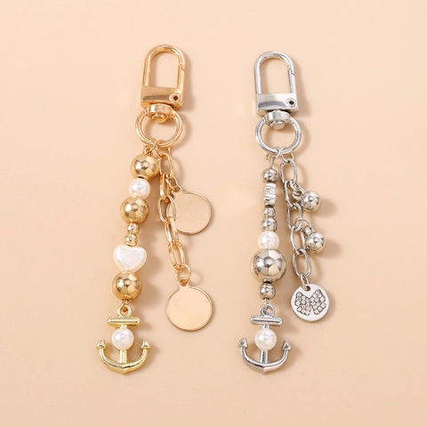 Portachiavi con Ancora in Lega di Zinco alla Moda con Pendente a Forma di Cuore e Fiocco in Perla Artificiale e Strass per Donna