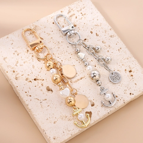 Portachiavi con Ancora in Lega di Zinco alla Moda con Pendente a Forma di Cuore e Fiocco in Perla Artificiale e Strass per Donna