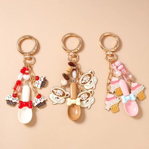 Moda Portachiavi in Lega di Zinco Smalto Tazzina da Caffè Cupcake Gelato Con Cucchiaio Fiocco Perlina Ciondolo Borsa Donna