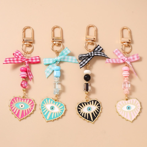 Porte-clés Perlé Cœur Mauvais Œil pour Femmes Nœud Ruban Plaid Pendentif de Sac Alliage de Zinc Émail Accessoire de Clé Cadeau