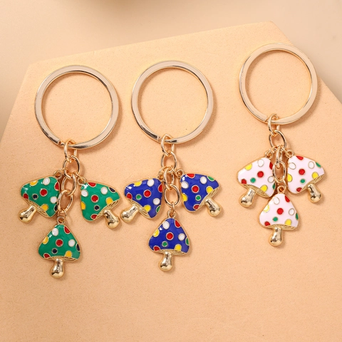 Llavero de Seta de Moda Con Amuletos de Esmalte de Lunares Aleación de Zinc Anillo Dorado Lindo Colgante de Bolsa Planta para Mujeres