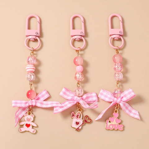 Porte-clés Doux Rose en Perles Cœur Ours Nœud à Carreaux Bijou de Sac en Alliage de Zinc Acrylique pour Femme Déco Sac à Dos Cadeau