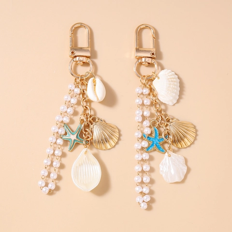 Llavero de Estilo Marino con Estrella de Mar y Concha con Borla de Perlas Artificiales Aleación de Zinc Colgante Bolso