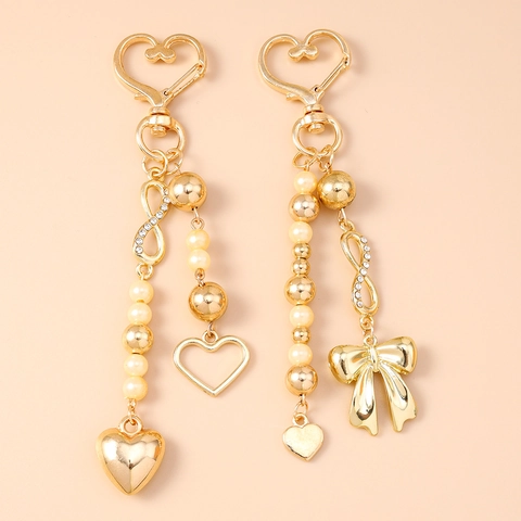 Portachiavi in Lega di Zinco a Cuore con Fiocco per Donna con Strass Luccicanti Perla Artificiale Simbolo Infinito Ciondolo per Borsa