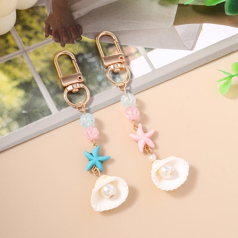 Portachiavi con Perline Oceaniche Estive Ciondolo a Forma di Stella Marina e Conchiglia con Perle Artificiali Portachiavi in Lega per Borsa Gioielli da Donna