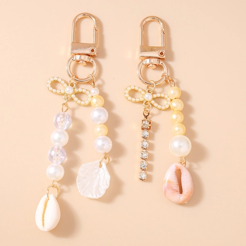 Llavero con Lazo Concha y Perla Artificial de Imitación Estilo Oceánico para Mujer Accesorio de Aleación Chapado en Oro con Strass