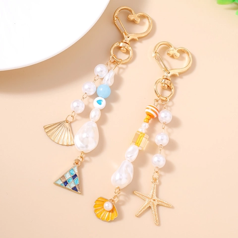 Llavero de Cuentas Temático de Océano Con Perla Artificial de Imitación Estrella de Mar Concha Corazón Colgante de Aleación de Oro Bolsa