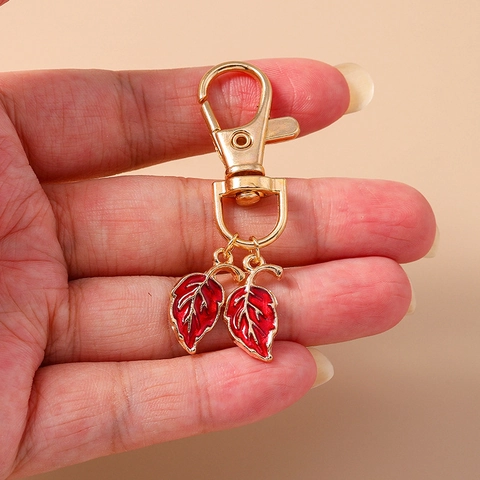 Llavero Creativo de Esmalte con Forma de Hoja Aleación de Zinc Chapado en Oro Colgante de Bolsa Joyería para Mujer Regalo