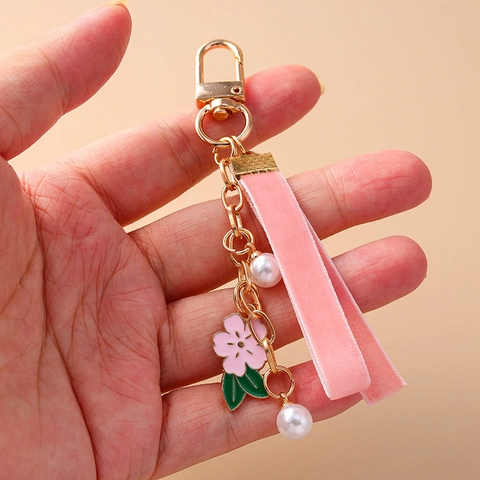 Japanischer Süßer Sakura Blume Schlüsselanhänger Emaille Zinklegierung Perle Samtband Tasche Anhänger Damen Mode Schlüsselring