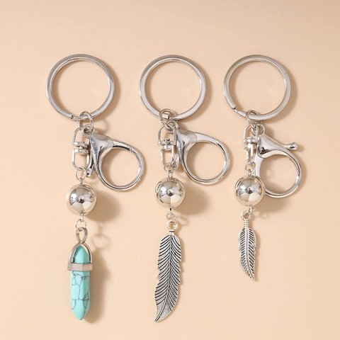 Boho Vintage Zinklegierung Türkis Sechseckiges Prisma Feder Schlüsselanhänger Für Damen Herren Tasche Anhänger Schmuck Geschenk