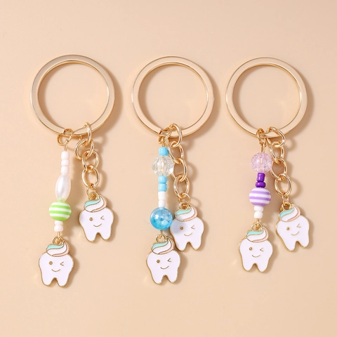 Llavero de Diente de Dibujos Animados Lindo Colgante de Bolsa de Diente Sonriente de Esmalte Con Cuentas de Colores Y Anillo de Aleación Dorado Para Mujeres Niños Regalo