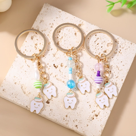 Llavero de Diente de Dibujos Animados Lindo Colgante de Bolsa de Diente Sonriente de Esmalte Con Cuentas de Colores Y Anillo de Aleación Dorado Para Mujeres Niños Regalo
