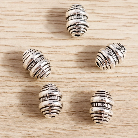 Perline Distanziatrici in Lega d'Argento Vintage a Forma di Botte con Motivo a Spirale per Bracciale Collana Fai-da-te
