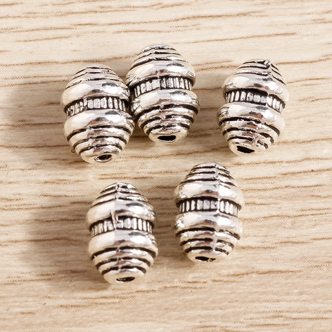 Perline Distanziatrici in Lega d'Argento Vintage a Forma di Botte con Motivo a Spirale per Bracciale Collana Fai-da-te