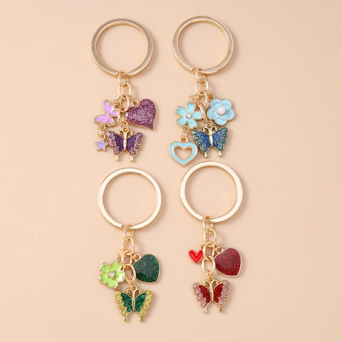Llavero de Corazón Hueco Mariposa Flor Colgante de Bolso Aleación de Zinc Perla Artificial Strass para Mujer Accesorio