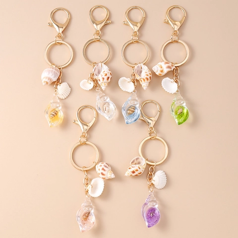 Portachiavi Conchiglia Oceano Anello in Lega Dorata Ciondolo in Resina di Lumaca di Mare Naturale Accessorio Luminoso Borsa