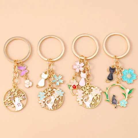 Enamel Cat Cherry Blossom Keychain Gold Alloy Hollow Out Flower Key Ring For Bag Decor Women Cute Rhinestone Gift