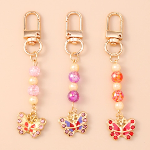 Sweet Butterfly Keychain Alloy Enamel Rhinestone Beaded Artificial Pearl Bag Charm For Women Fashion Jewelry Accessory