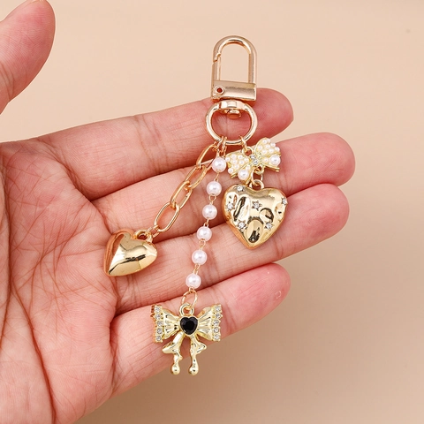 Vintage Gold Legierung Schleife Herz Schlüsselanhänger Für Damen Elegant Nachahmung Künstliche Perle Strass Tasche Anhänger Modeschmuck