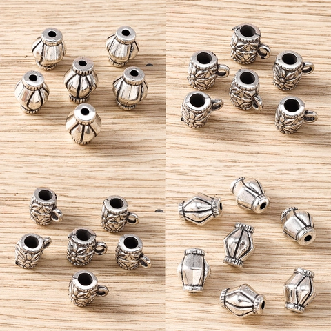 Perline Distanziatrici a Fiori Galvanizzate in Plastica Vintage Argento Antico Forma a Lanterna Accessori per Gioielli Fai-da-te