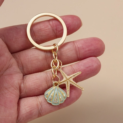 Portachiavi in Lega di Zinco con Stella Marina e Conchiglia Strass Oro Blu Smalto Ciondolo Borsa Donna Regalo