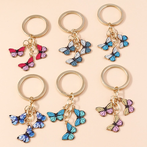 Porte-clés Papillon en Alliage à la Mode Avec Pendentifs en Émail à Rayures Colorées Anneau en Métal Doré Charme Sac Femme