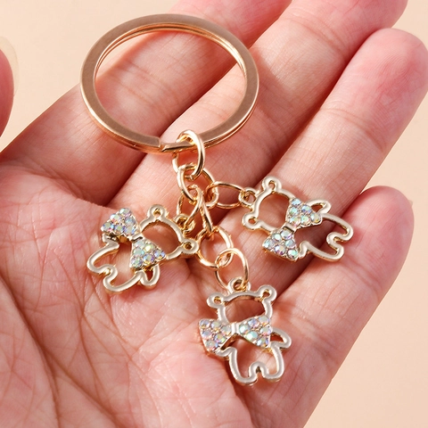 Portachiavi a Forma di Orsetto Traforato in Metallo Con Fiocco in Strass Colorati Pendente per Borsa Lusso Leggero Regalo Donna
