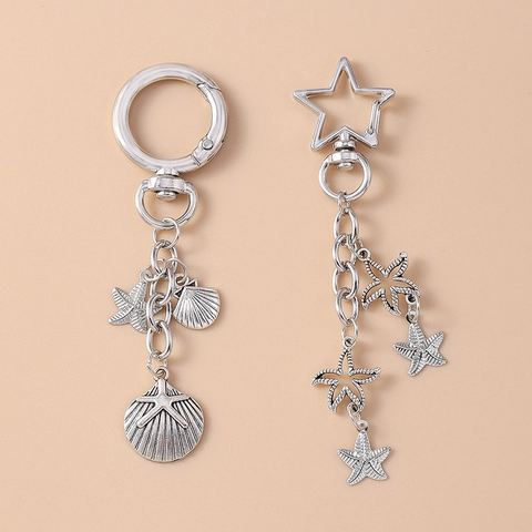 Llavero de Metal Plateado Vintage con Estrella de Mar y Concha Colgante de Bolso Tema Océano Hebilla de Estrella Verano Playa