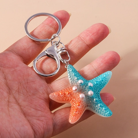 Portachiavi Creativo a Stella Marina in Resina Colore Sfumato Pendente per Zaino Con Finta Perla Artificial Simpatico Animale Marino Regalo